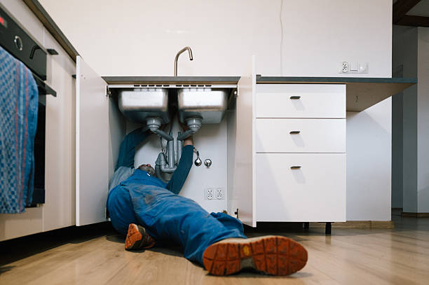Professional Emergency Plumber technician working in Johnson, AR